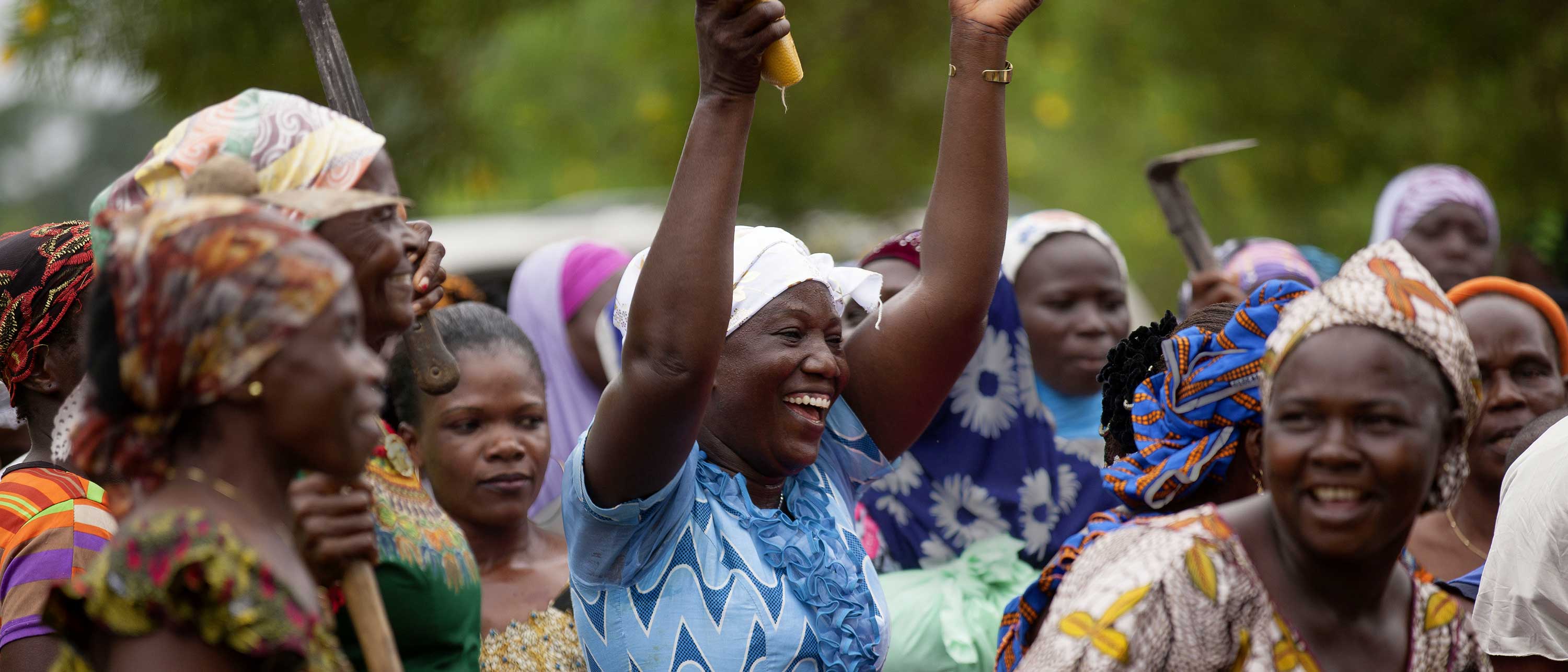 Women in the Côte D'Ivoire celebrate the launch of a new marketplace