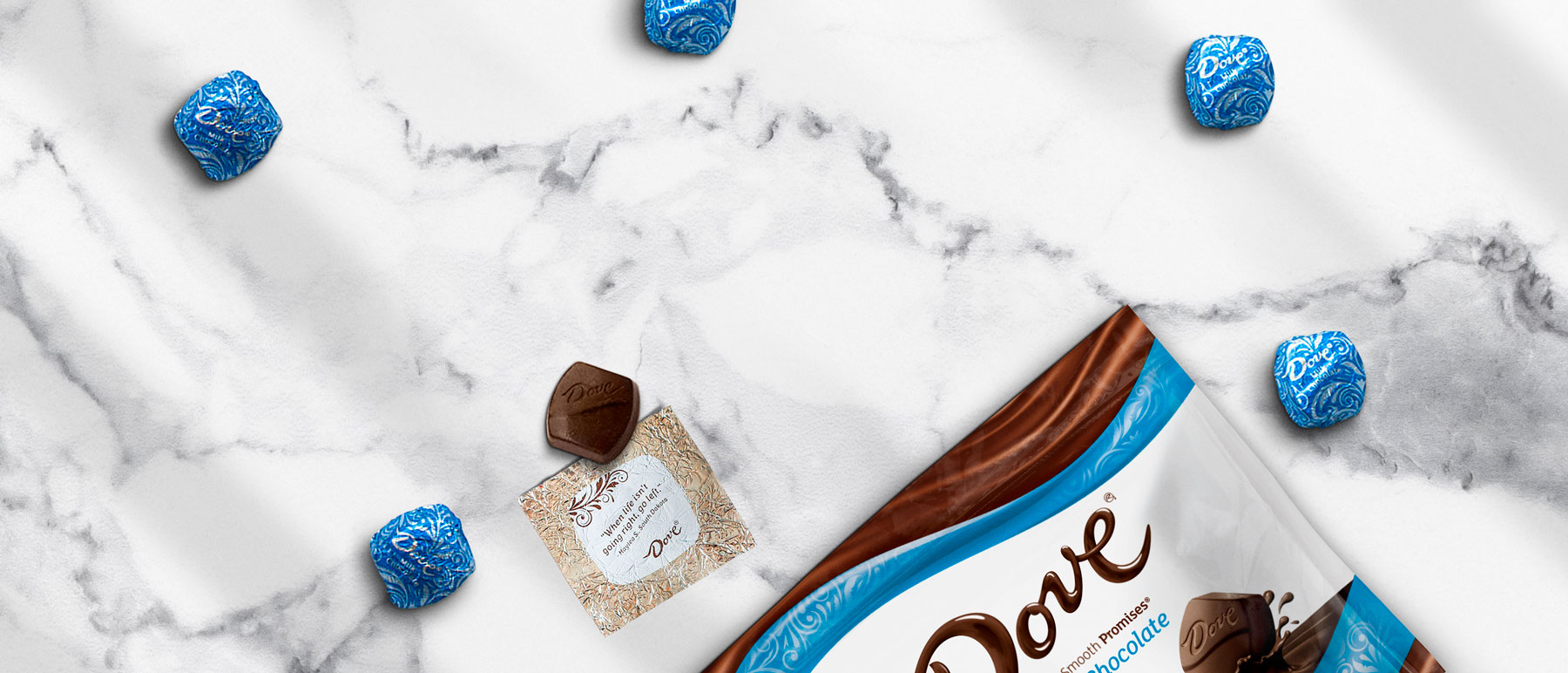Dove Promises Candies on a marble background